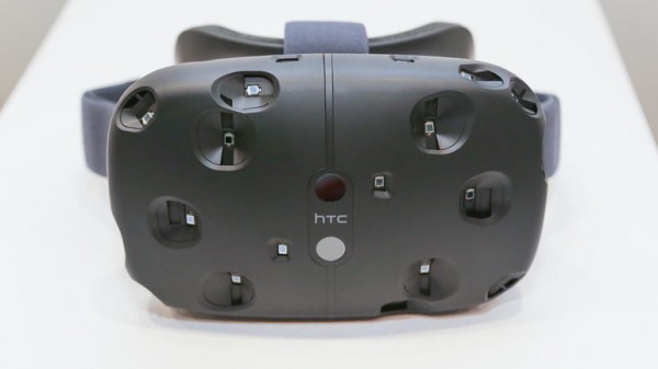 Frontal view of HTC's VR headset Vive placed on top of a white table